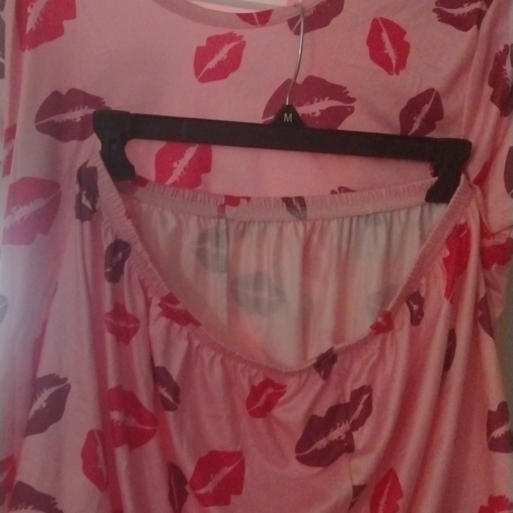 Pink pajamas with lips on